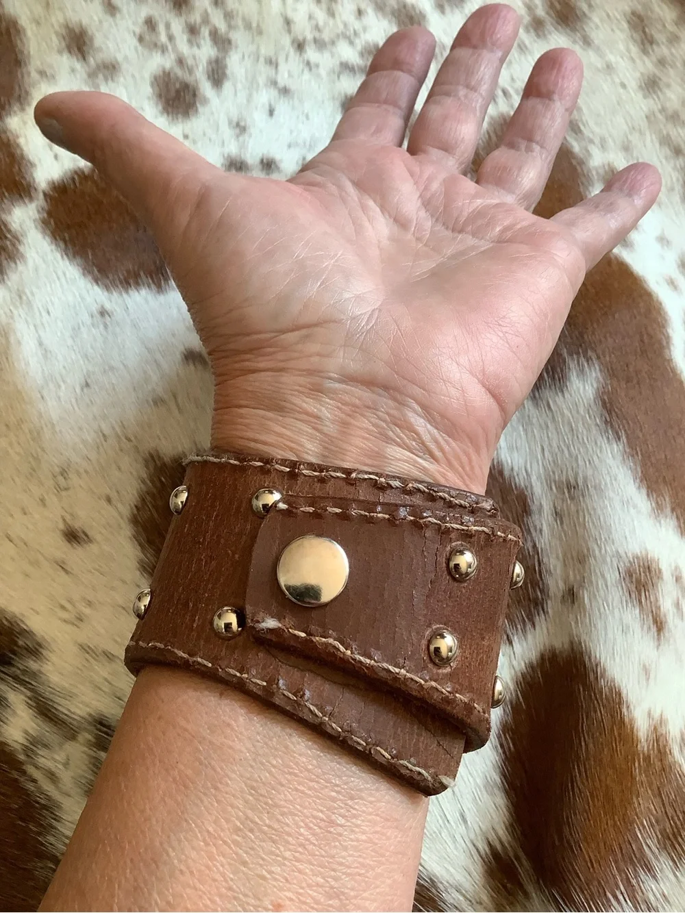 Leather cuff, adjustable 6-6 3/4” wrist